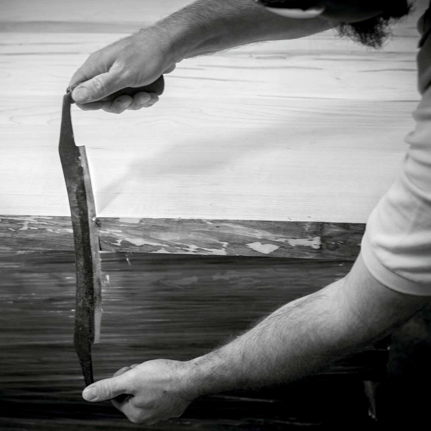 artisan shaving tree bark